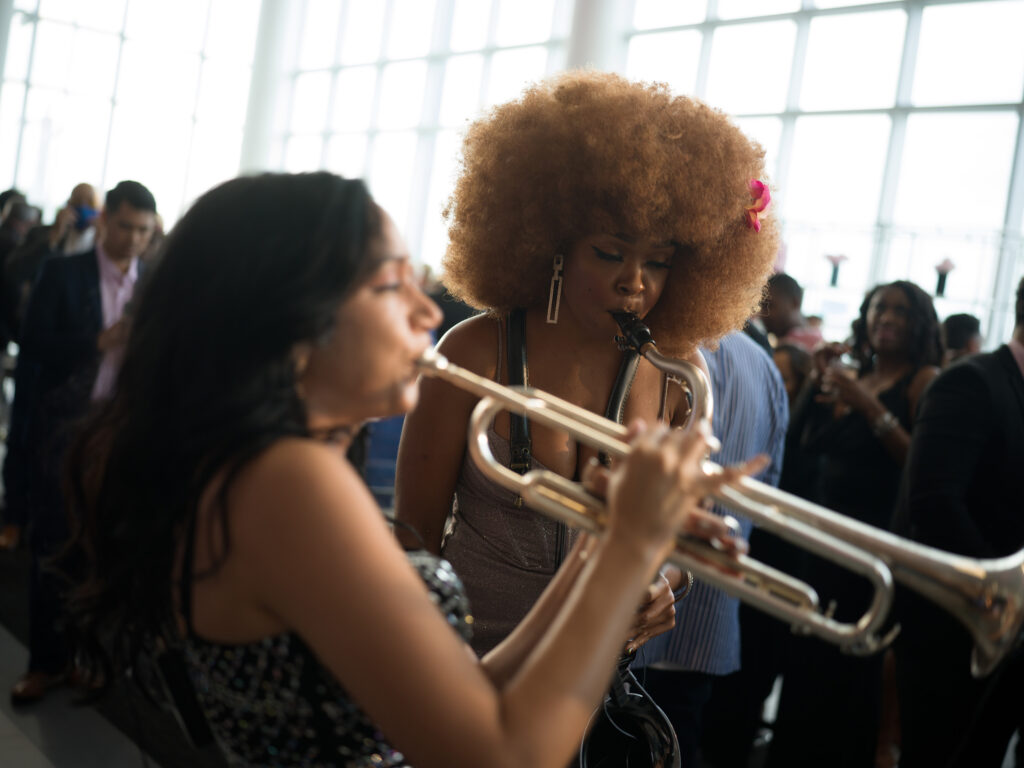 Cleo Fox on sax and trumpeter stir things up at the grand opening of Central Houston Cadillac's new location near NRG Park (Photo by Daniel Ortiz)