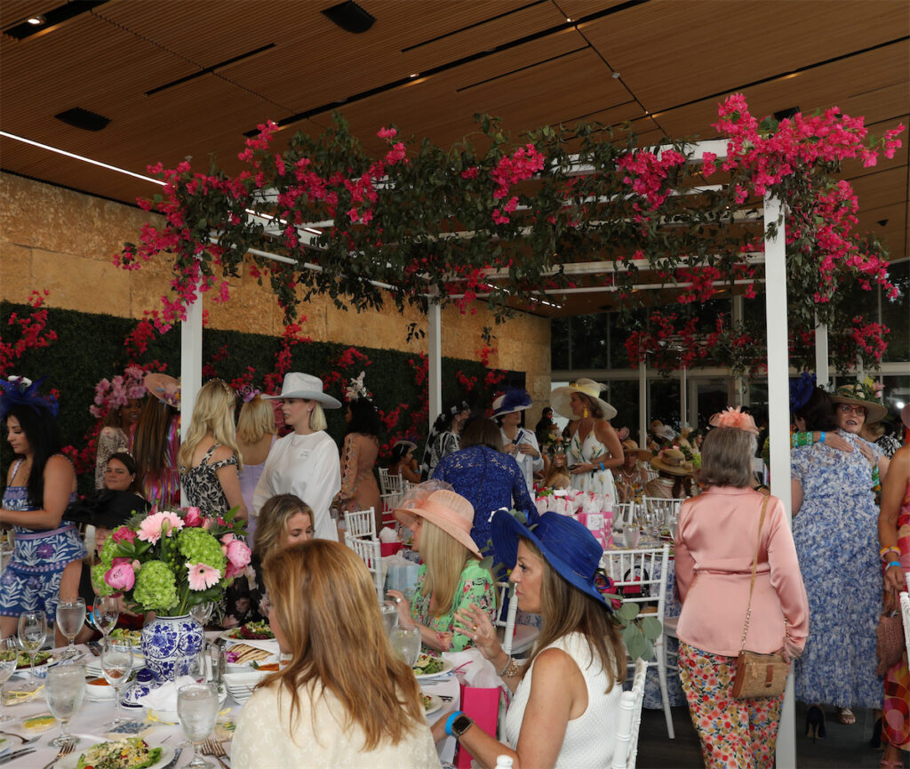 The scene in A Tasteful Place for Mad Hatter's (Photo by Thomas Garza and Rob Wythe)