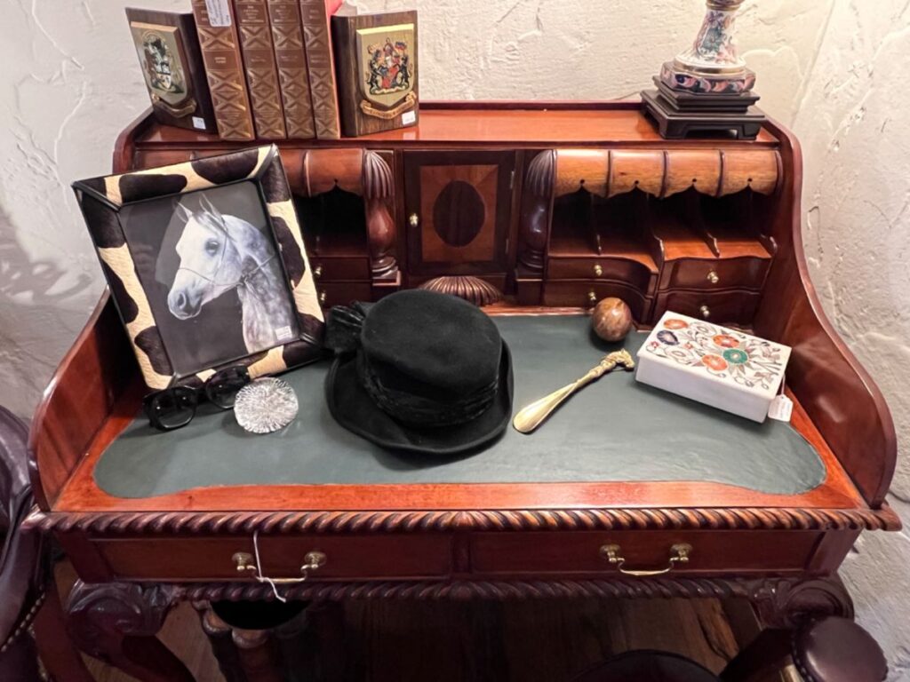 An equestrian-themed desk display is a nod to Marilyn Hoffman's passion for Arabian horses.(Photo by Dallas Estate Sellers)