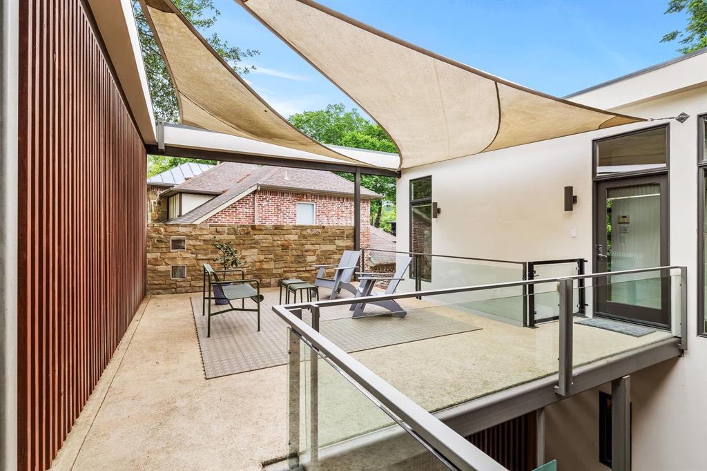 An expansive, shaded rooftop deck. 