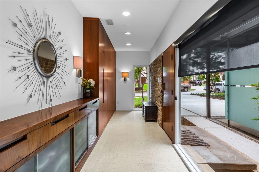 Custom wood accents abound throughout the 3,696-square-foot home.