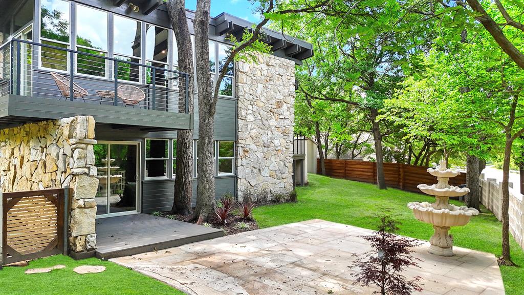 A vintage fountain makes a statement in the backyard. 