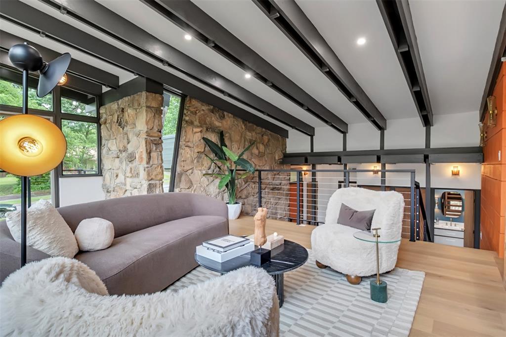 A lofted sitting area. 