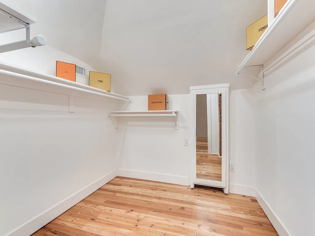 A "secret" walk-in closet tucked into the primary suite. 