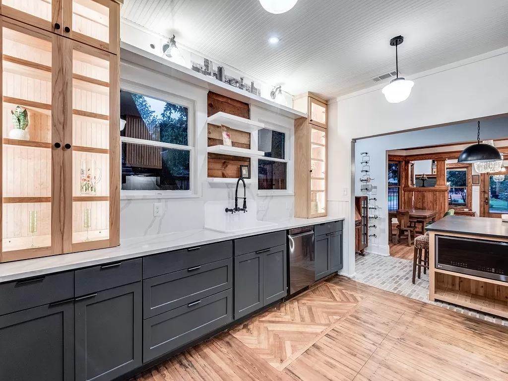 An updated kitchen features stunning new cabinetry.