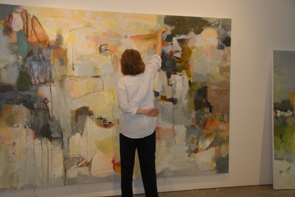 Artist Terrell James works on one of her large scale paintings in her Houston studio. (Photo by Gergas)