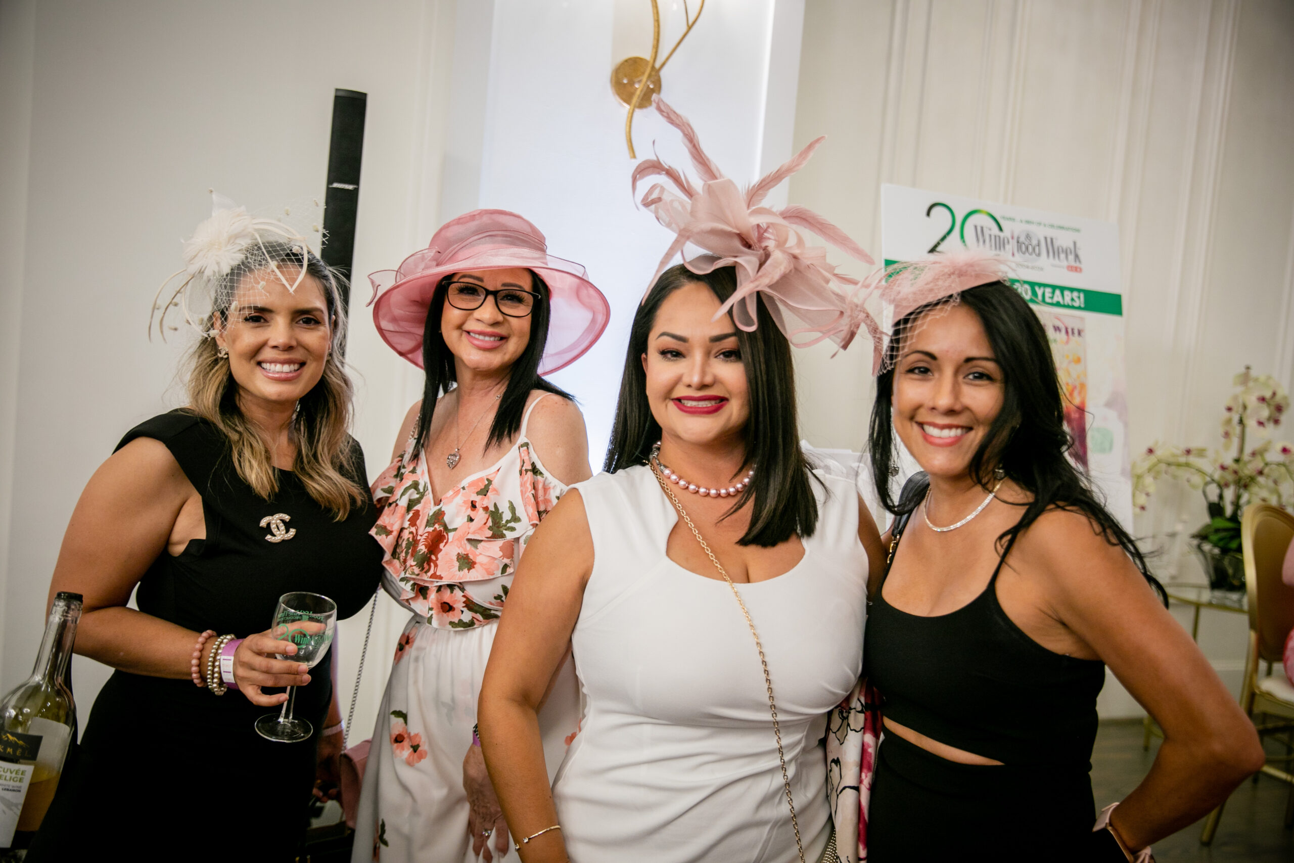 Wine lovers at Rosé Way donned derby hats while enjoying reds, pinks and bubbles at the Peach Orchard during Wine & Food Week in The Woodlands.