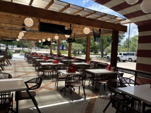 The patio at the new Niko Niko's in The Woodlands seats 100, and has a small outdoor greenspace for games.