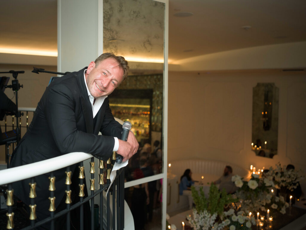 Benjamin Berg welcomes VIP guests to the opening of his opulent steakhouse Turner's Cut (Photo by Daniel Ortiz)