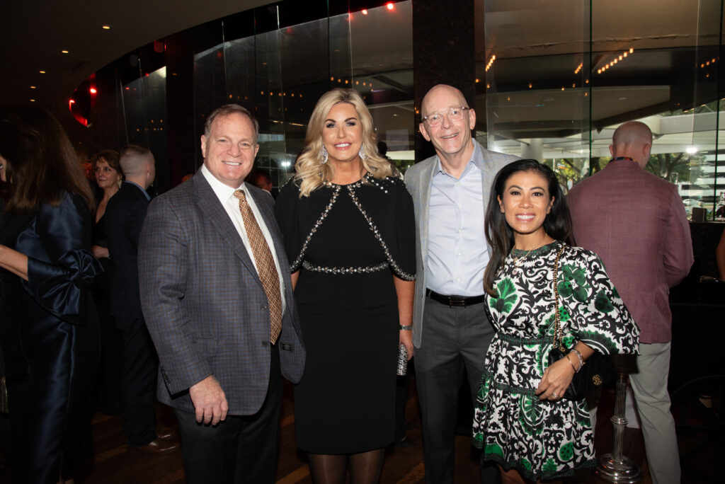 The Women's Fund wine dinner chairs Dr. Mark & Stephanie Schusterman with Jay Sears and Chau Nguyen (Photo by Alexander's Fine Portrait Design)
