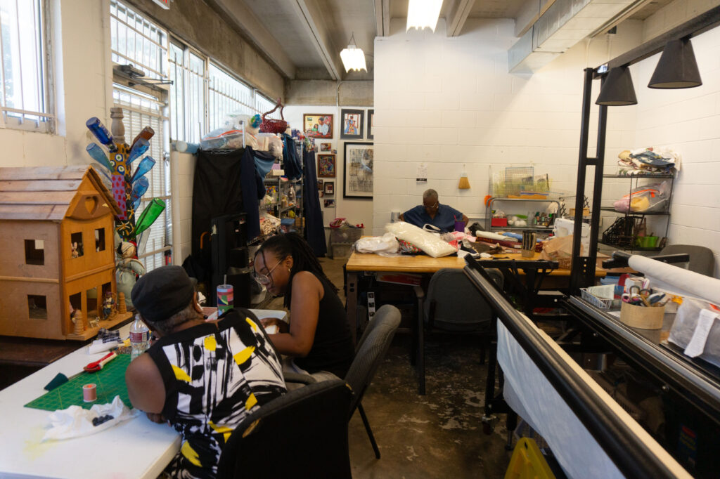 In house quilters in The Community Artists' Collective quilting studio (Photo by Sofia Westerman) 