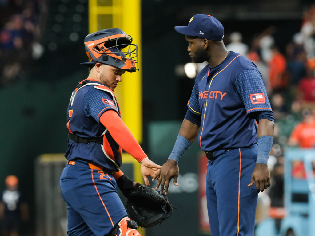 Yainer Diaz and Yordan Alvarez celebrate an Astros moment. (Photo by F. Carter Smith) 