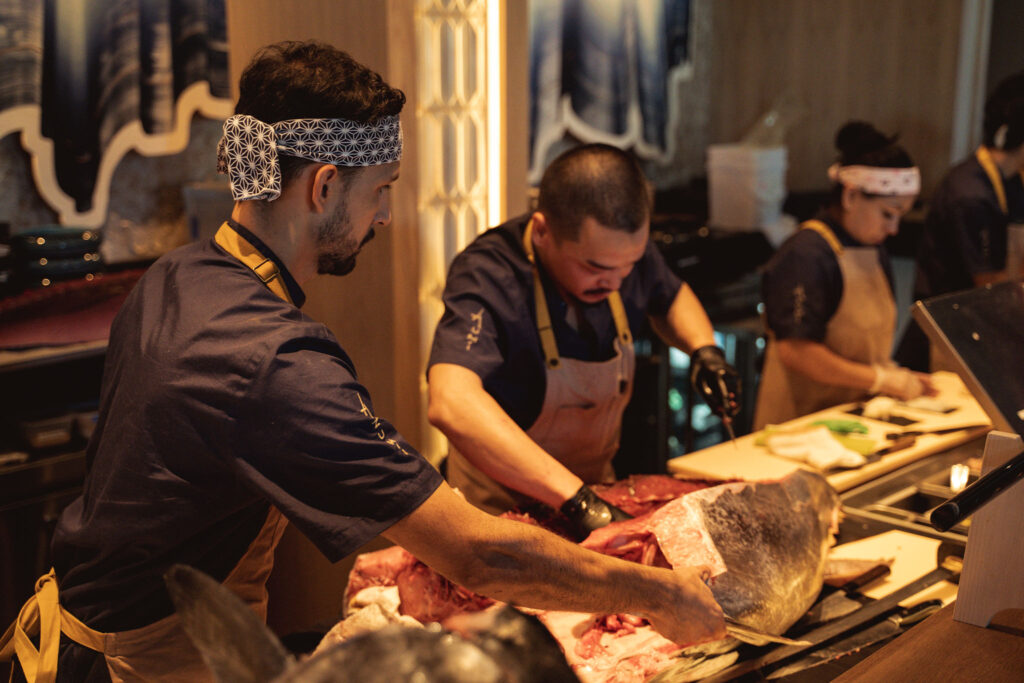 The 160-pound bluefin tuna, flown in from Japan that morning, is broken down by chefs at the opening of Azumi in River Oaks District. (Photo by Jonah Tijerina)