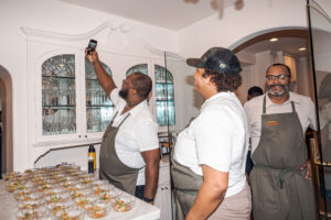 Chefs Tristen Epps. Anitra Broussard, and Lawrence Walker pose for a selfie