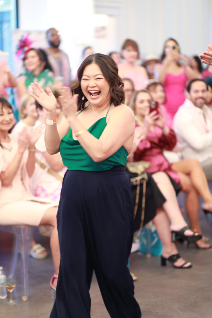 Designer Chloe Dao took a bow after the fashion show at Rosé Way at the Peach Orchard during Wine & Food Week in The Woodlands.