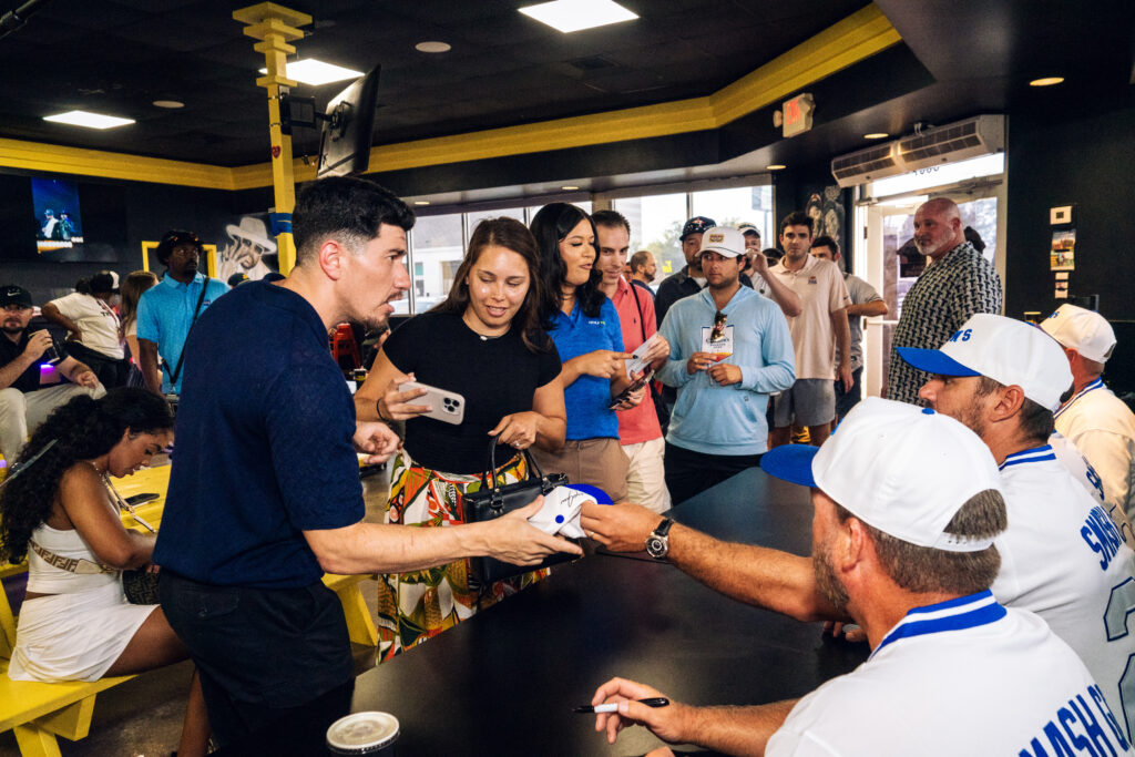 Golf fans enjoyed a meet and greet signing with Brooks Koepka and other LIV Golf stars at Trill Burgers. (Photo by Dylan McEwan)