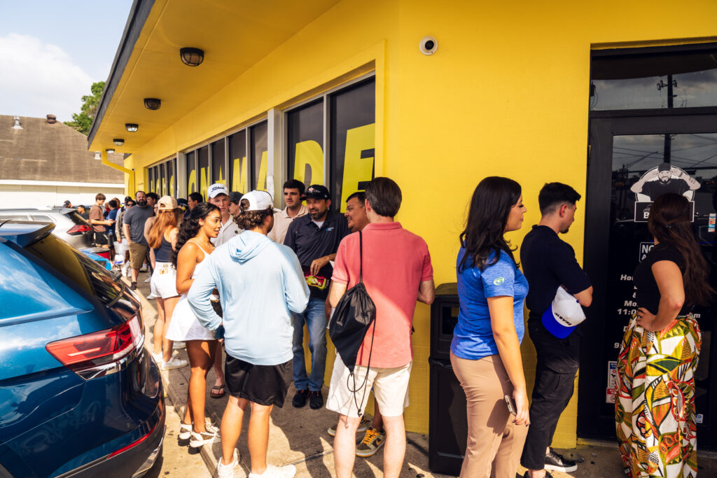Fans lined up outside of Trill Burgers for the meet and greet with LIV Golf stars. (Photo by Dylan McEwan)