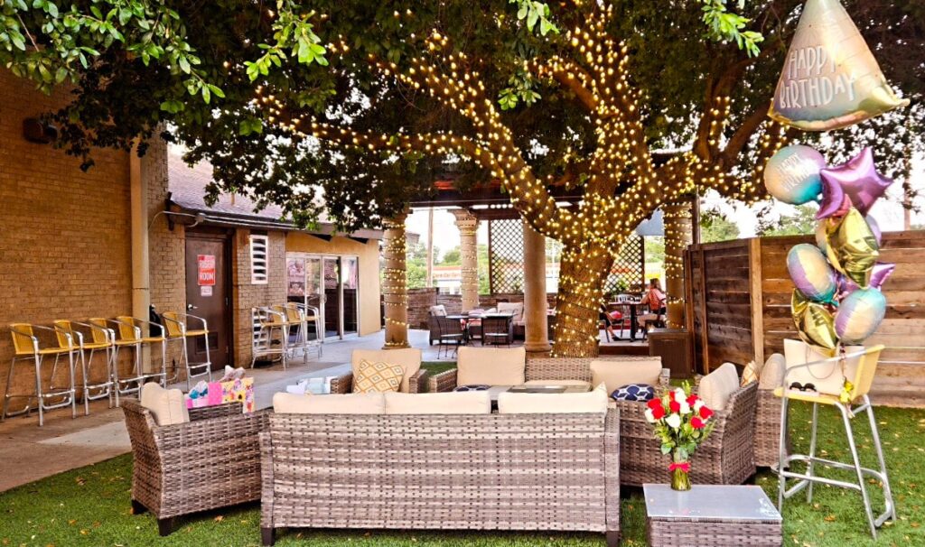 The shady patio and outdoor area at Three Barrels in Grapevine.