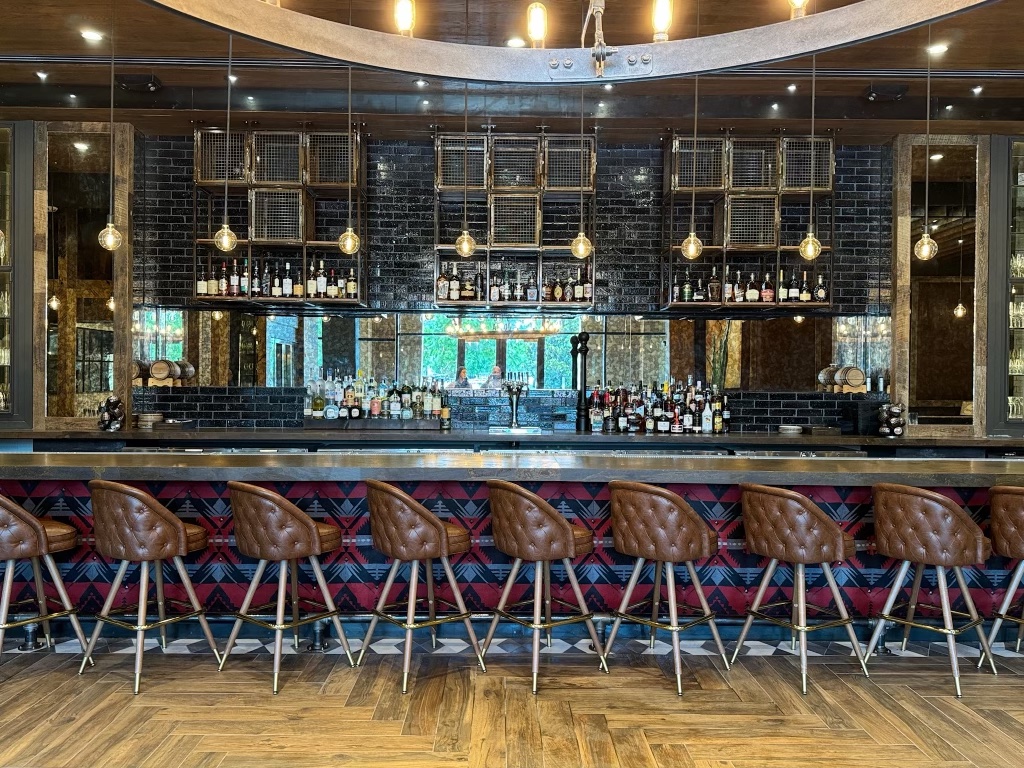 The bar at Haywire is inspired by FB-Society's original restaurant The Ranch at Las Colinas.