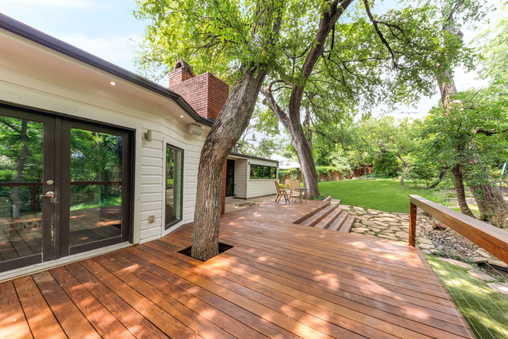 At 2365 Park Place, the lush backyard with mature trees offers a putting green and wood decks.