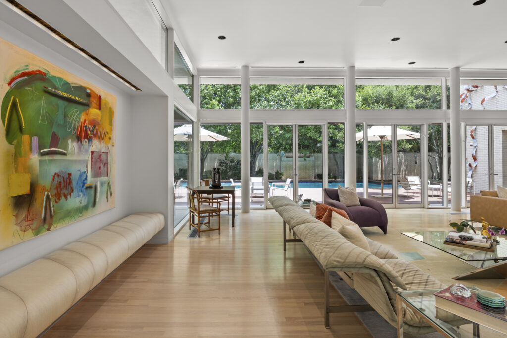  Blond woods and a view to the private poolside oasis beyond at 3950 Sarita Park Court.