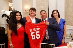 Laura Gudelman, 2024 Honored Hero Trace Langin, Matt Nowak, and Tiffany Nowak