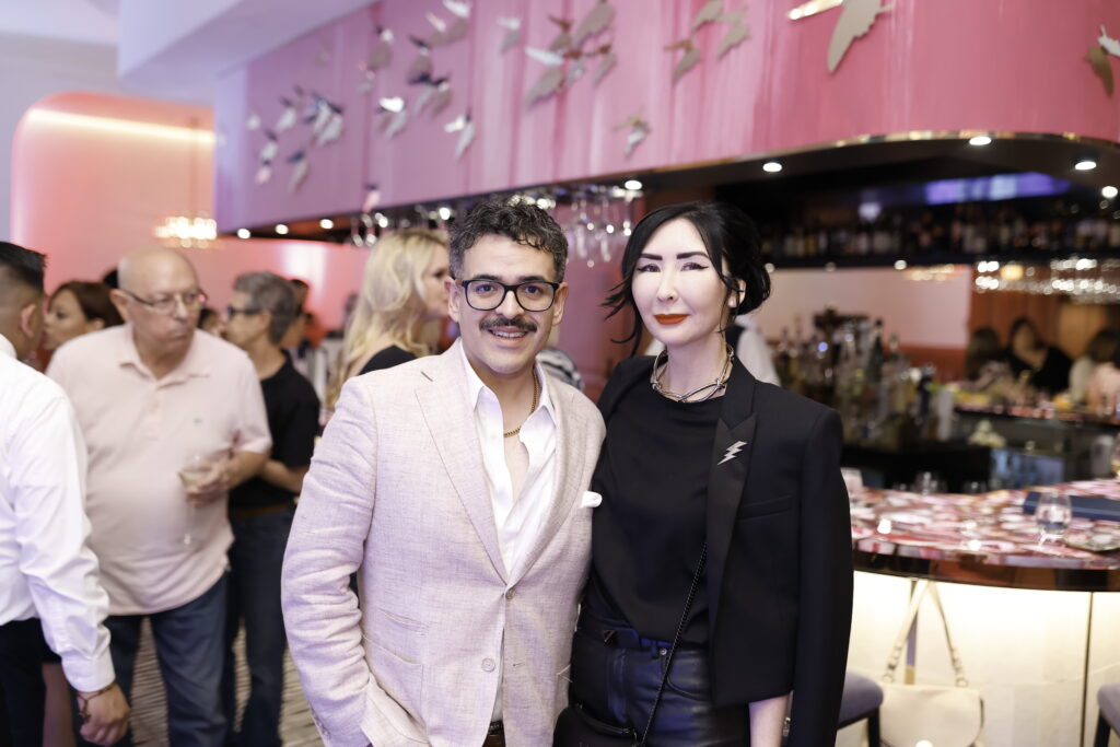 Mario Gudmundsson, Carrie Brandsberg-Dahl at the American Cancer Society 'Men Wear Pink' event at PostScript (Photo by Quy Tran)