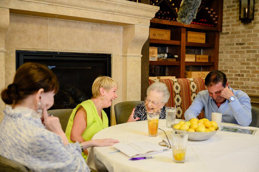 Laughter is acknowledged as the best medicine when Rosie Carrabba and Donna Lewis share their CanCare stories with Shelby Hodge and Johnny Carrabba for the 'Hope in the Face of Cancer: A Survivor by your Side' podcast. (Photo by Si Vo Photography)