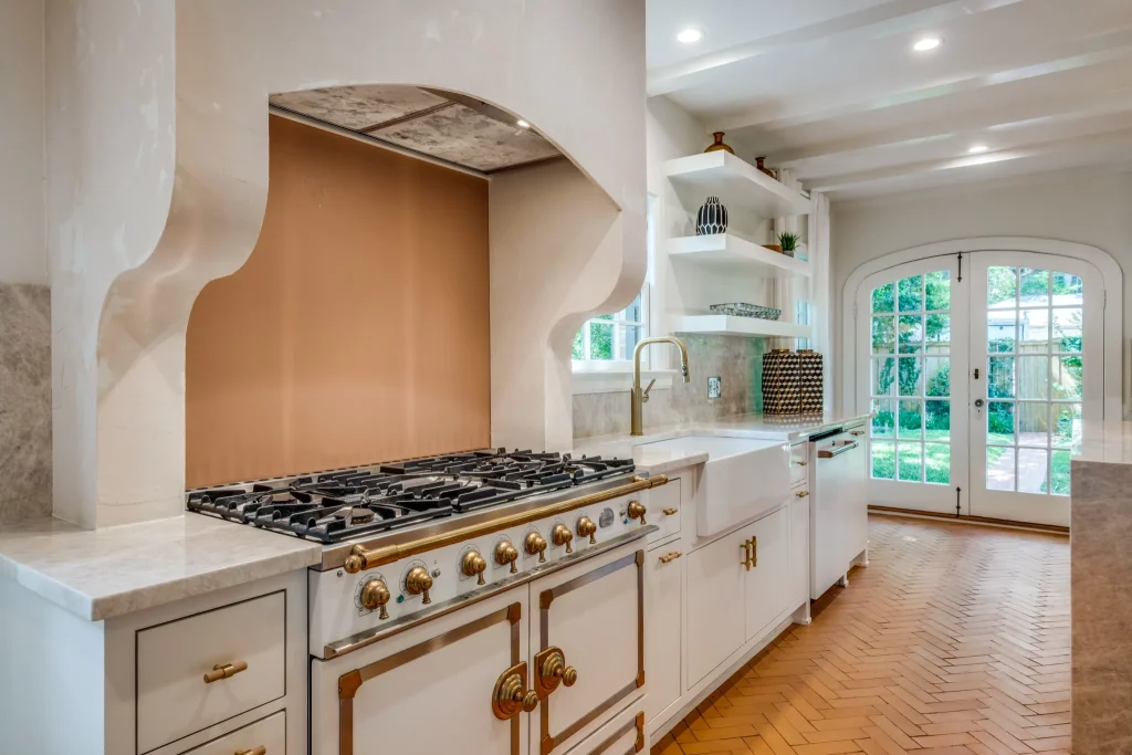 A handcrafted La Cornue range fits right into the kitchen's clean aesthetic. 