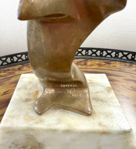 a Hattakitkosol Somchai sculpture at a Dallas estate sale