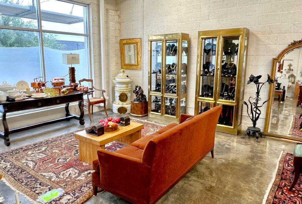 a corner vignette in the dallas design district with a Baker mohair sofa