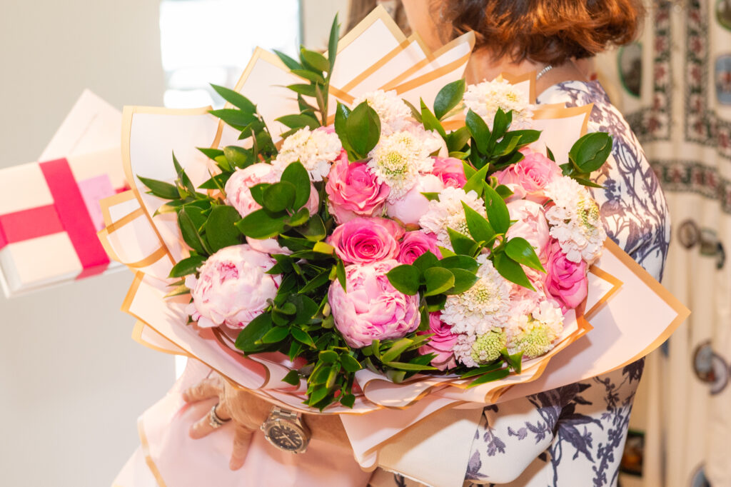 Bouquets for the honorees  at the 2025 Women of Distinction honoree reveal at Elizabeth Anthony (Photo by Jacob Power)