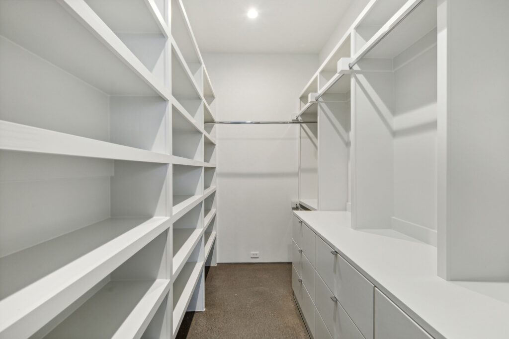 One of two generous walk-in closets. 