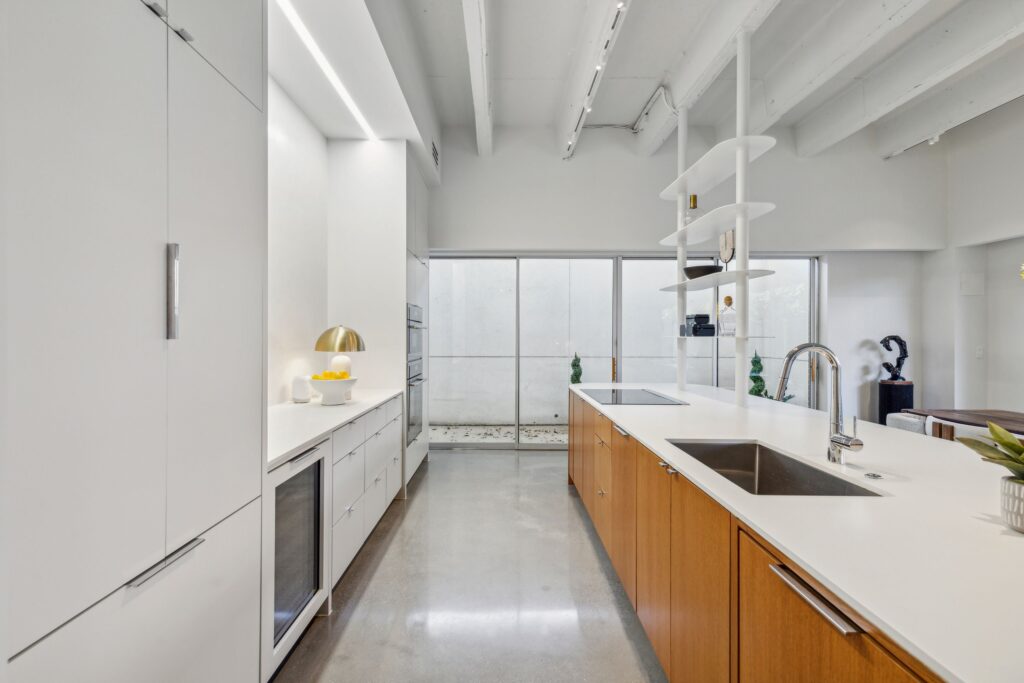 The update kitchen features European-style cabinetry and high end Thermador appliances. 