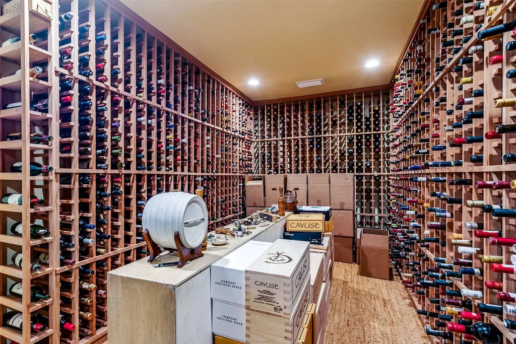 A 2,000-plus bottle wine room is a new addition to the 1930s Kessler Park Tudor home. 