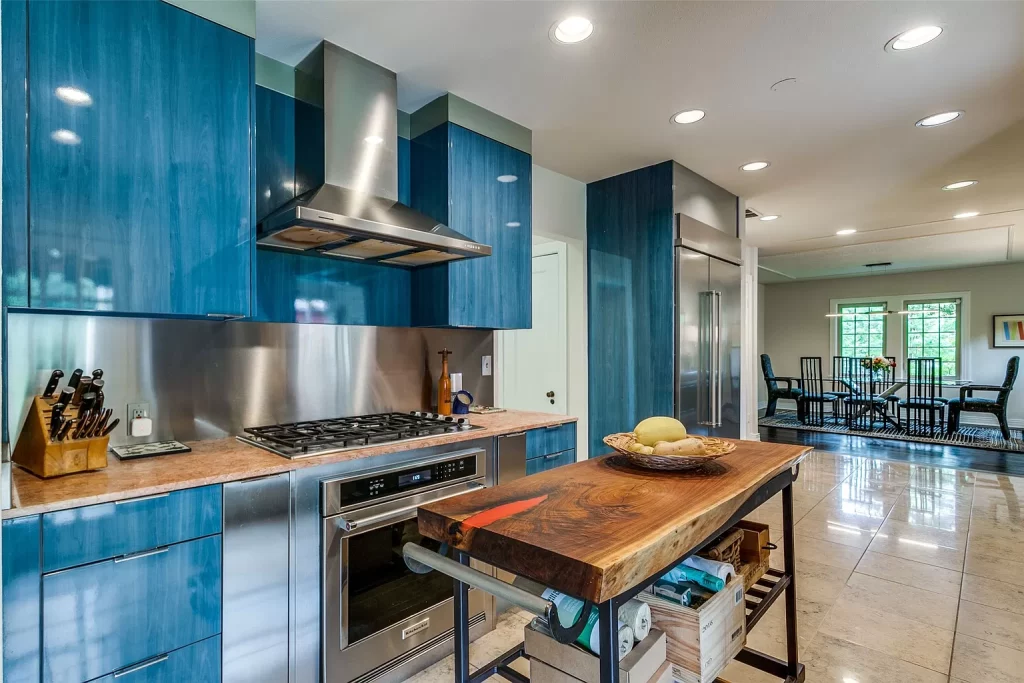 The updated kitchen features new KitchenAid appliances. 