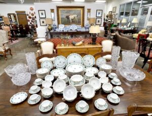 several china sets at a janelle stone dallas estate sale in the design district