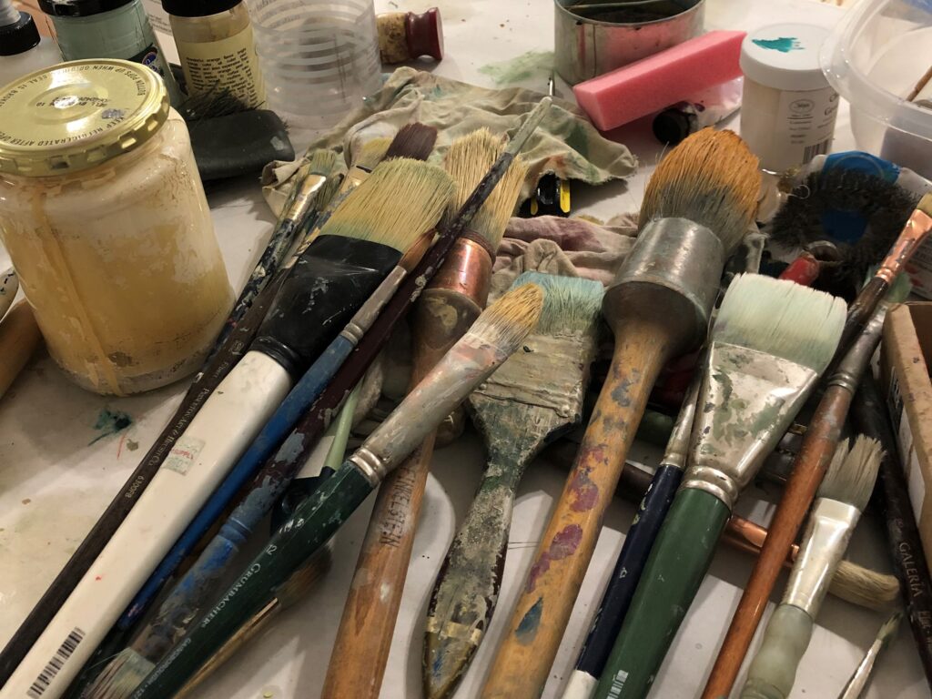 An assortment of paintbrushes artist Terrell James uses in her studio. (Photo by Cameron Armstrong)