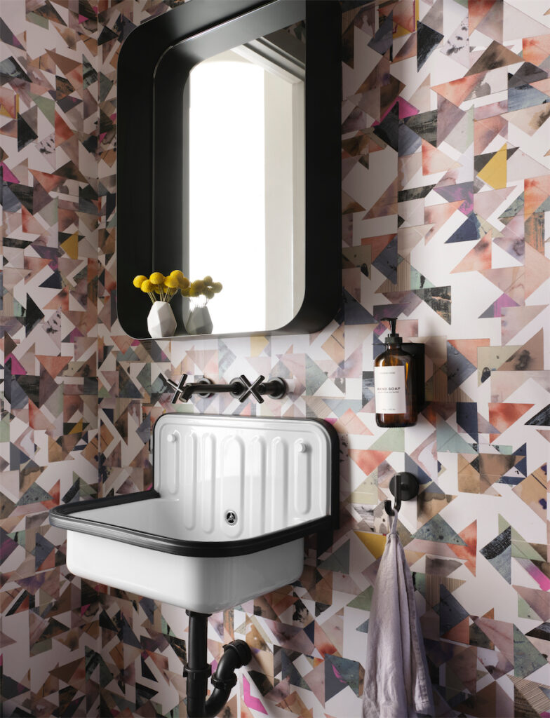 A wallpapered powder room in the University Park home in Dallas. (Photo by Lisa Petrole)