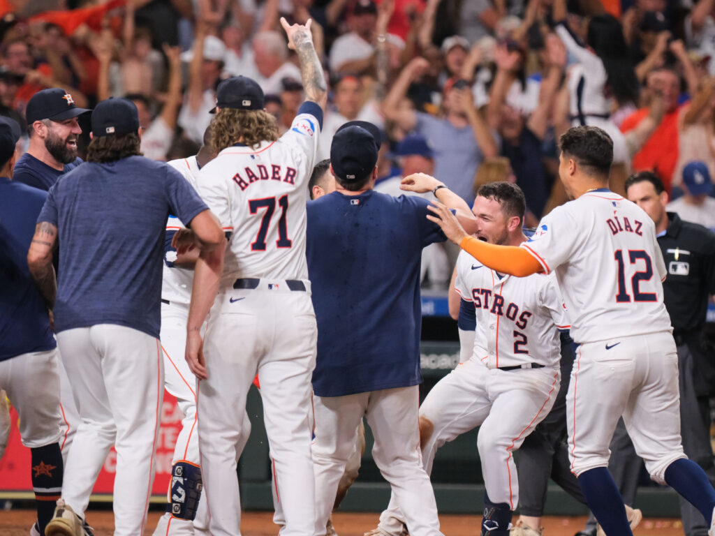 Alex Bregman's ninth inning walkoff of the Los Angeles Dodgers created a mad party at home plate for the happy Astros. (Photo by F. Carter Smith)
