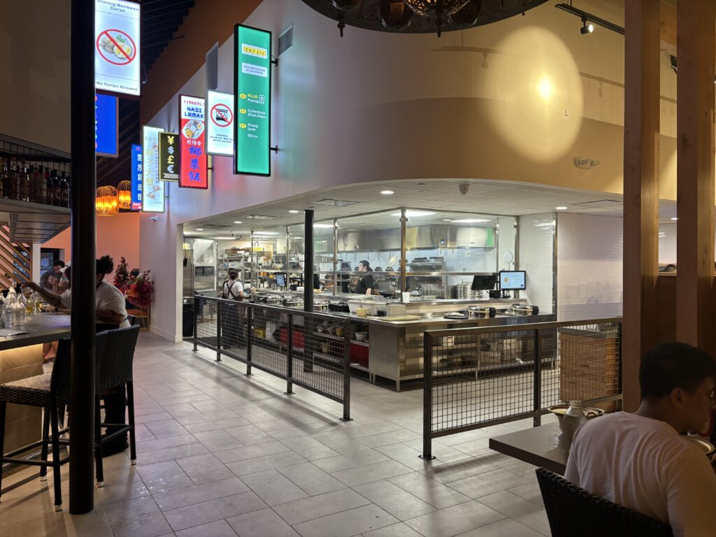 The bar and open kitchen area are open to the front dining area. (Photo by Laura Landsbaum)