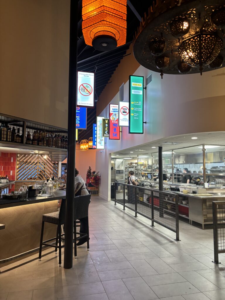 Signage in Phat Eatery gives a different feel to the newest restaurant in The Woodlands. (Photo by Laura Landsbaum)