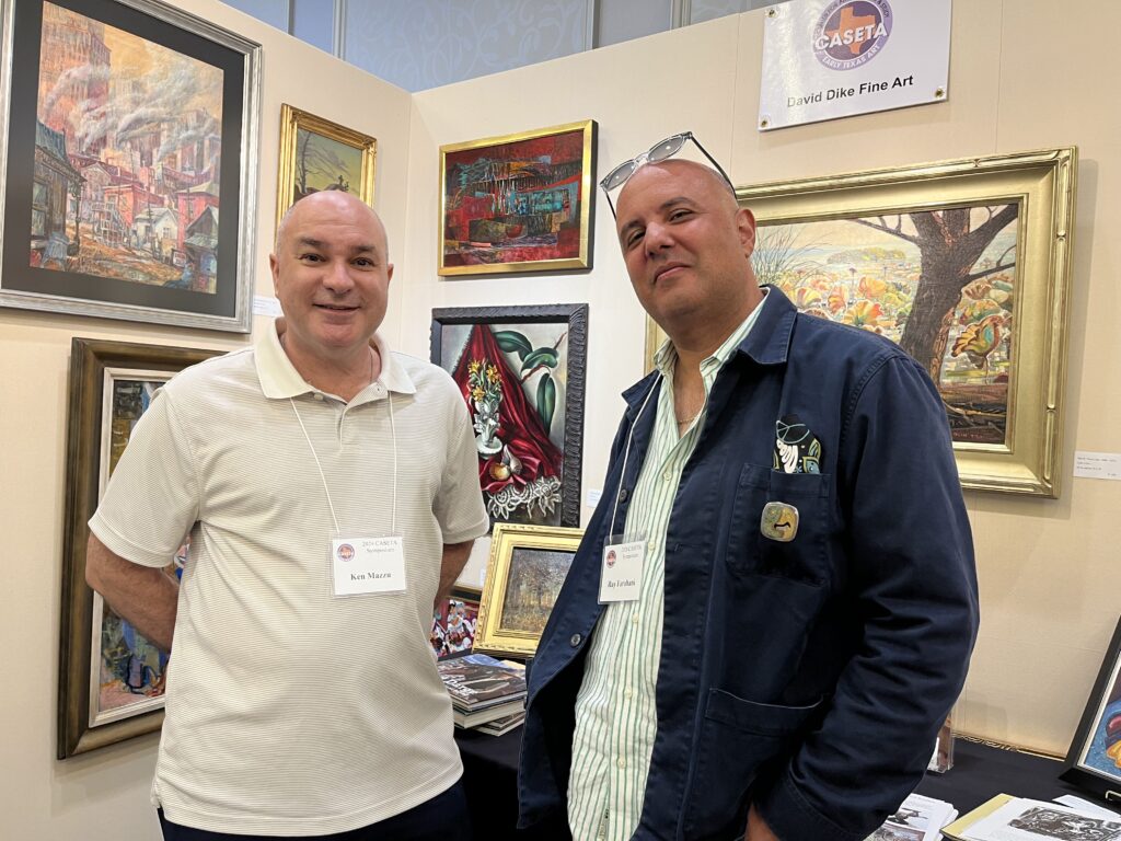 Ken Mazzu and Ray Farahani admire art in David Dike Fine Art Booth. (Photo by Catherine D. Anspon)