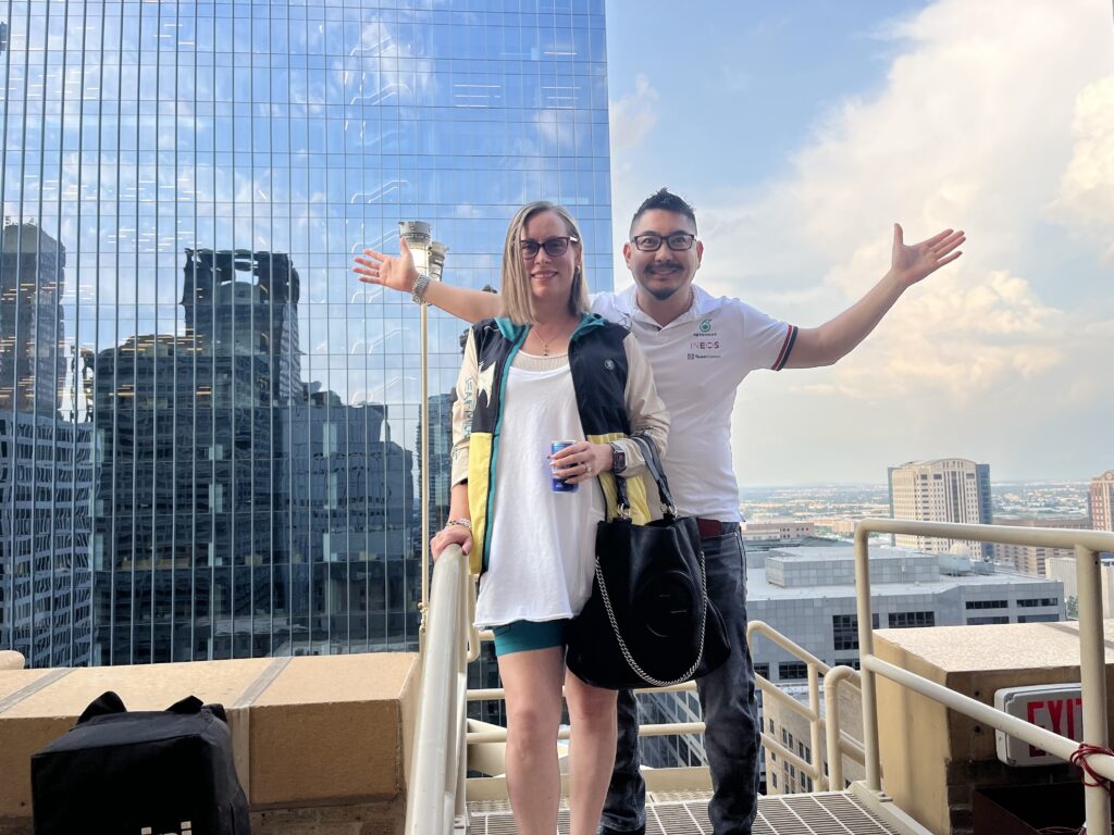 Krishena Anderson & Marcos Ikeda admire the view from a balcony at Kaze Burning Man Esperson Building. (Photo by Jenna Baer).