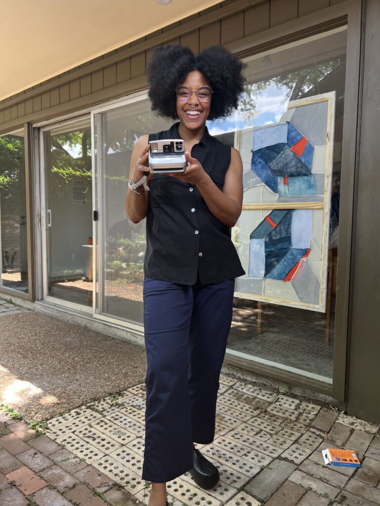 FLATS' curator Ryan Francisco gears up for Art Mass at "Interwoven." (Photo by Catherine D. Anspon).