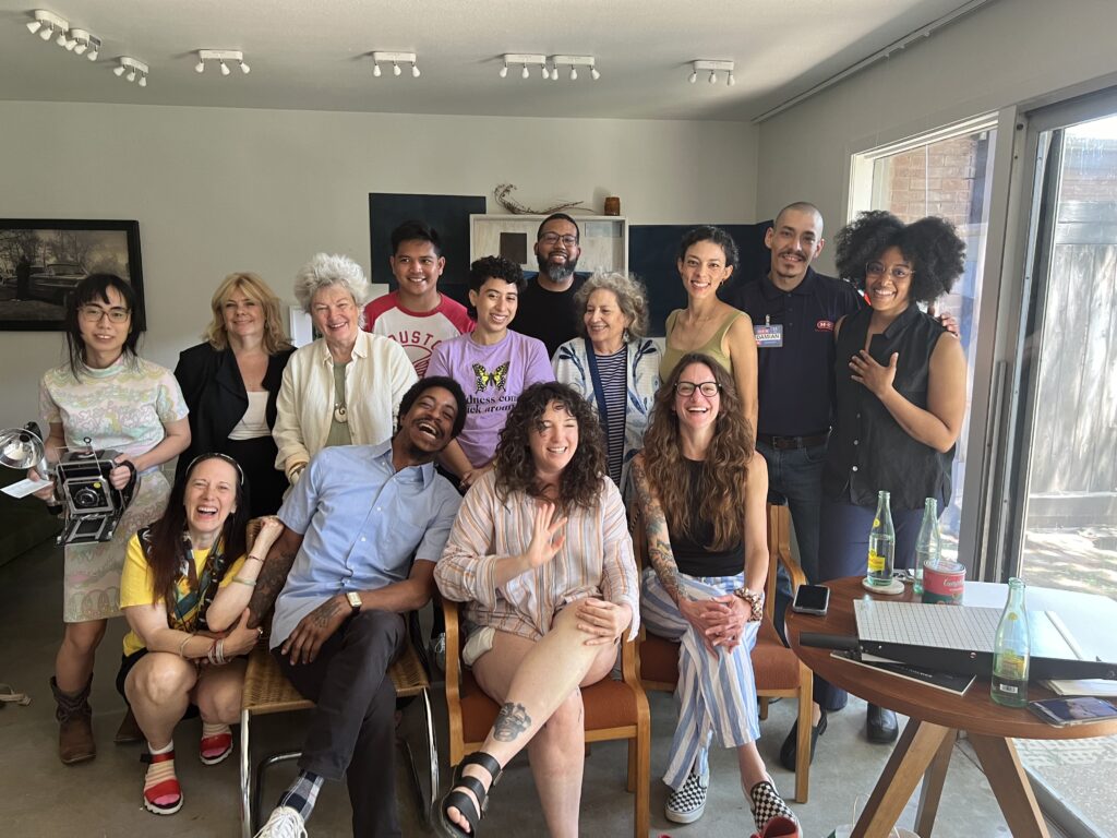 Photographers and photo enthusiasts celebrate Art Mass at FLATS' "Interwoven." (Photo by Catherine D. Anspon)