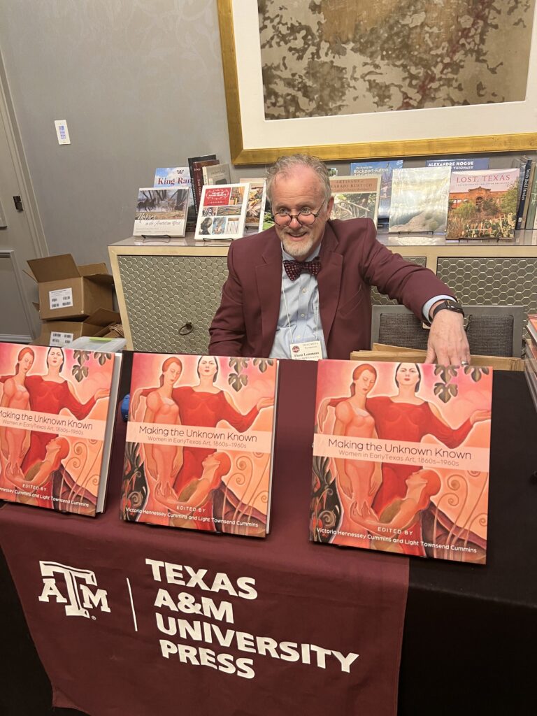 Thomas Lemmons, editor in chief of Texas A&M University Press, showcases the press' newest volume, "Making the Unknown Known: Women in Early Texas Art, 1860s-1960s."  (Photo by Catherine D. Anspon)