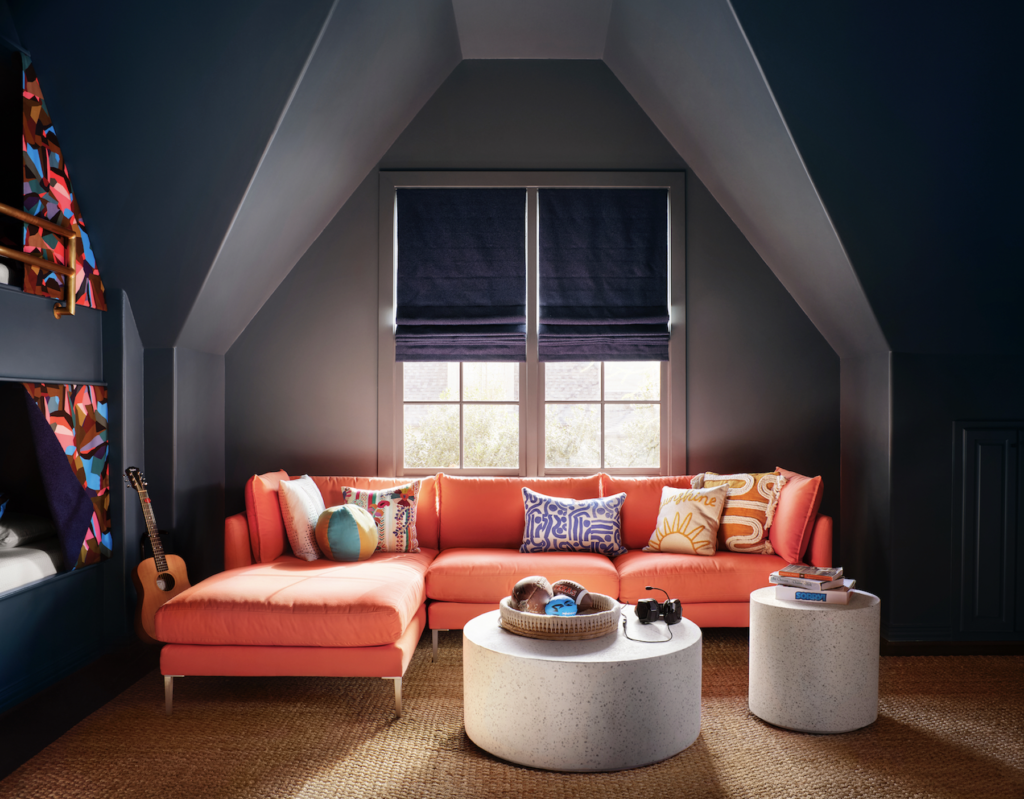 Sectional sofa from Room & Board with pillows from Urban Outfitters, The Curtain Shop, and Mellow Monkey. CB2 coffee tables. (Photo by Lisa Petrole)