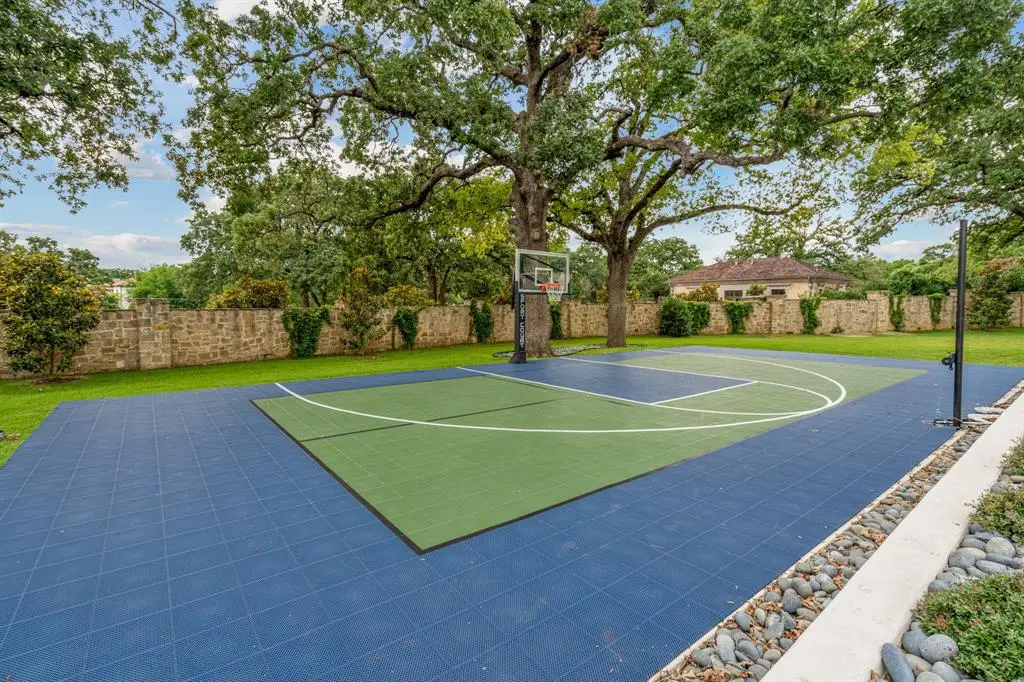 The half-court sports court adds to recreation appeal.