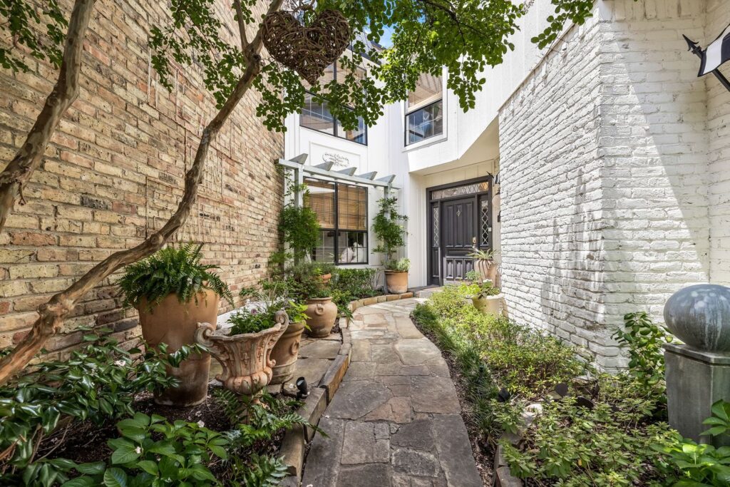 The lush front courtyard was a major selling point for Brittany Cobb, a California native. 